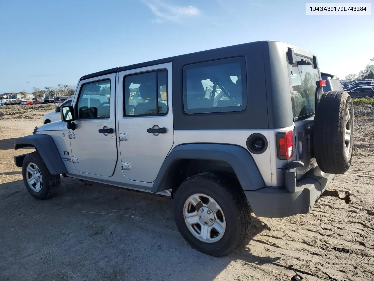 2009 Jeep Wrangler Unlimited X VIN: 1J4GA39179L743284 Lot: 76188374