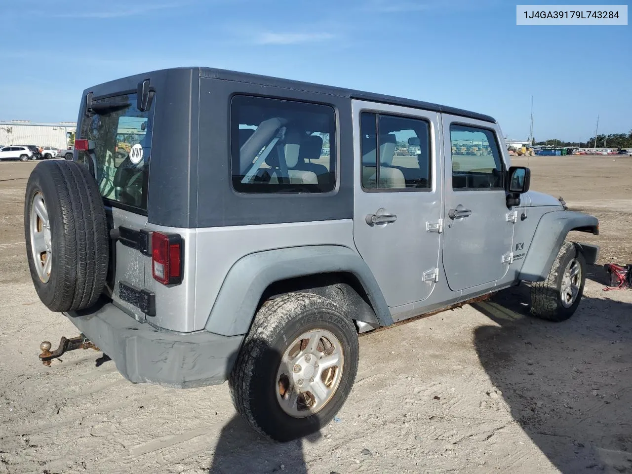 2009 Jeep Wrangler Unlimited X VIN: 1J4GA39179L743284 Lot: 76188374