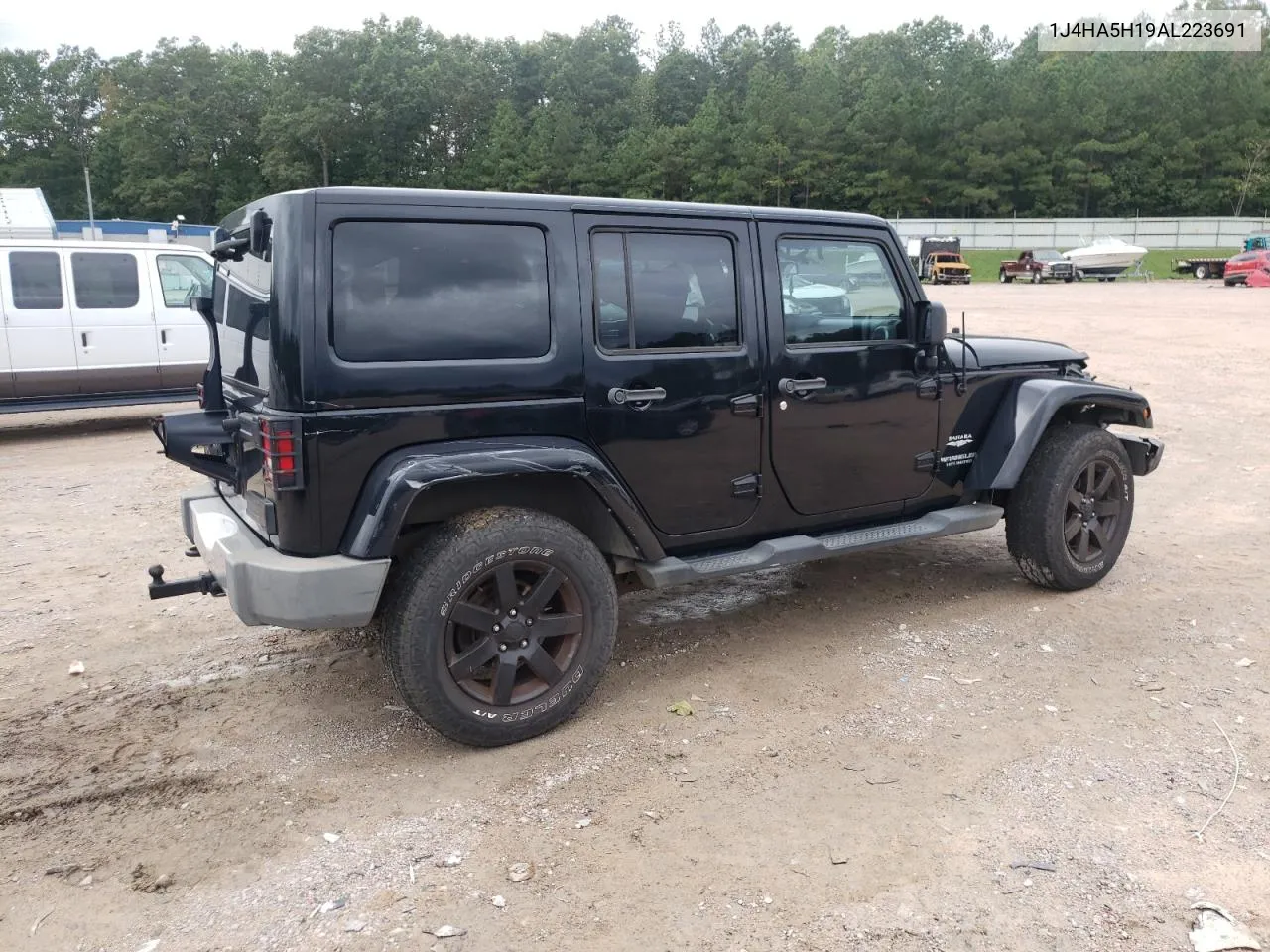 2010 Jeep Wrangler Unlimited Sahara VIN: 1J4HA5H19AL223691 Lot: 74106384