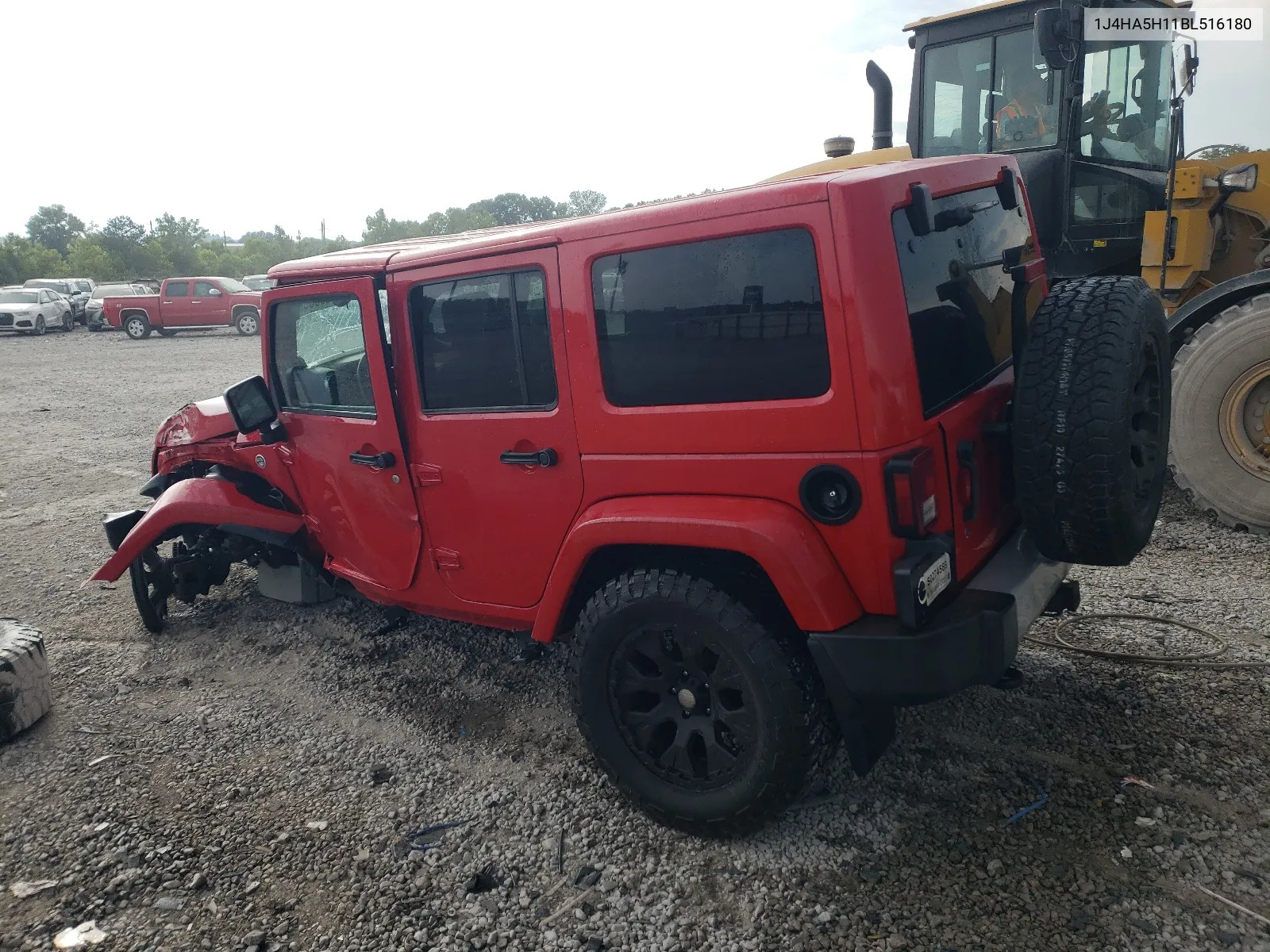 2011 Jeep Wrangler Unlimited Sahara VIN: 1J4HA5H11BL516180 Lot: 60906234