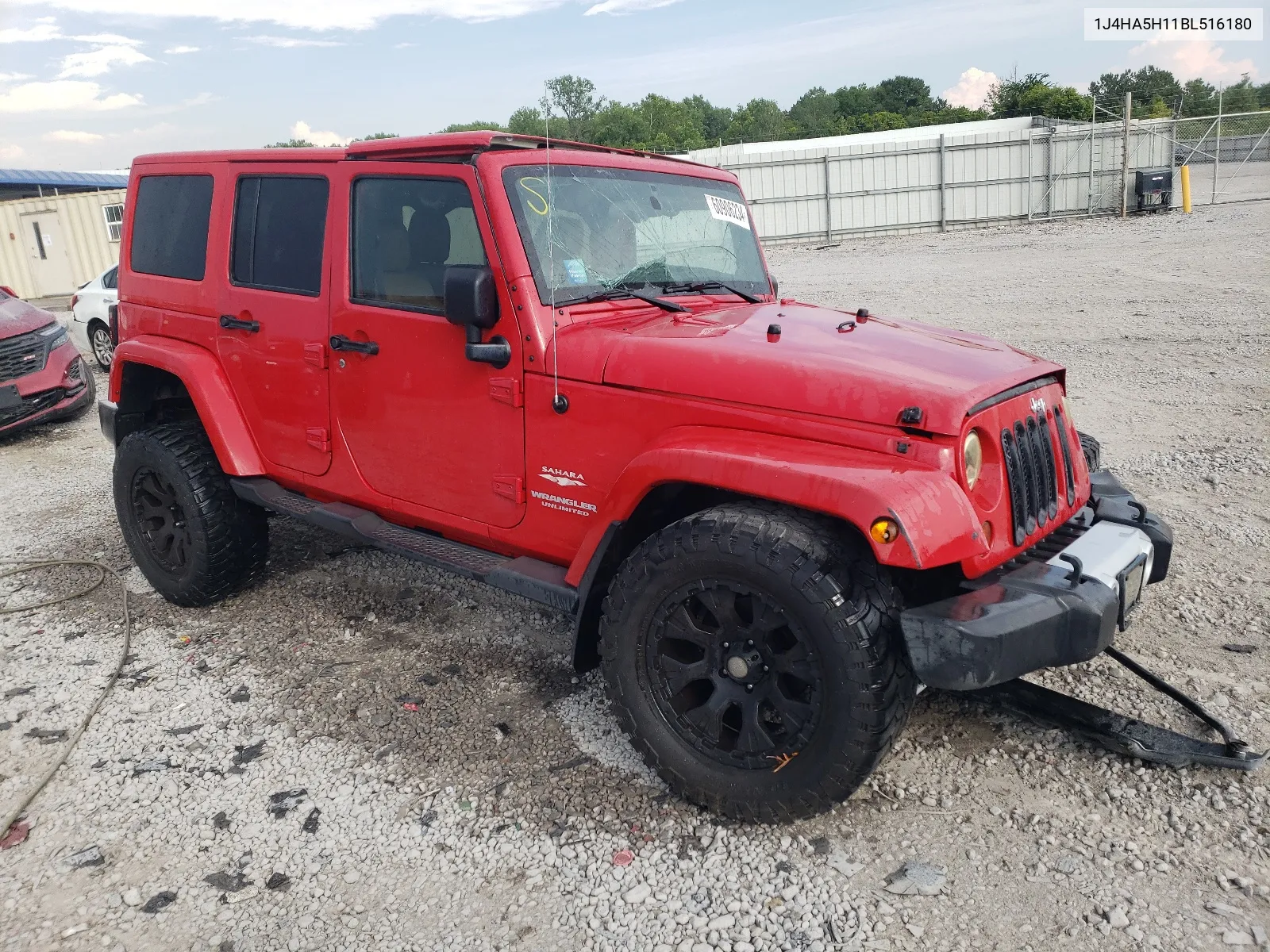 2011 Jeep Wrangler Unlimited Sahara VIN: 1J4HA5H11BL516180 Lot: 60906234