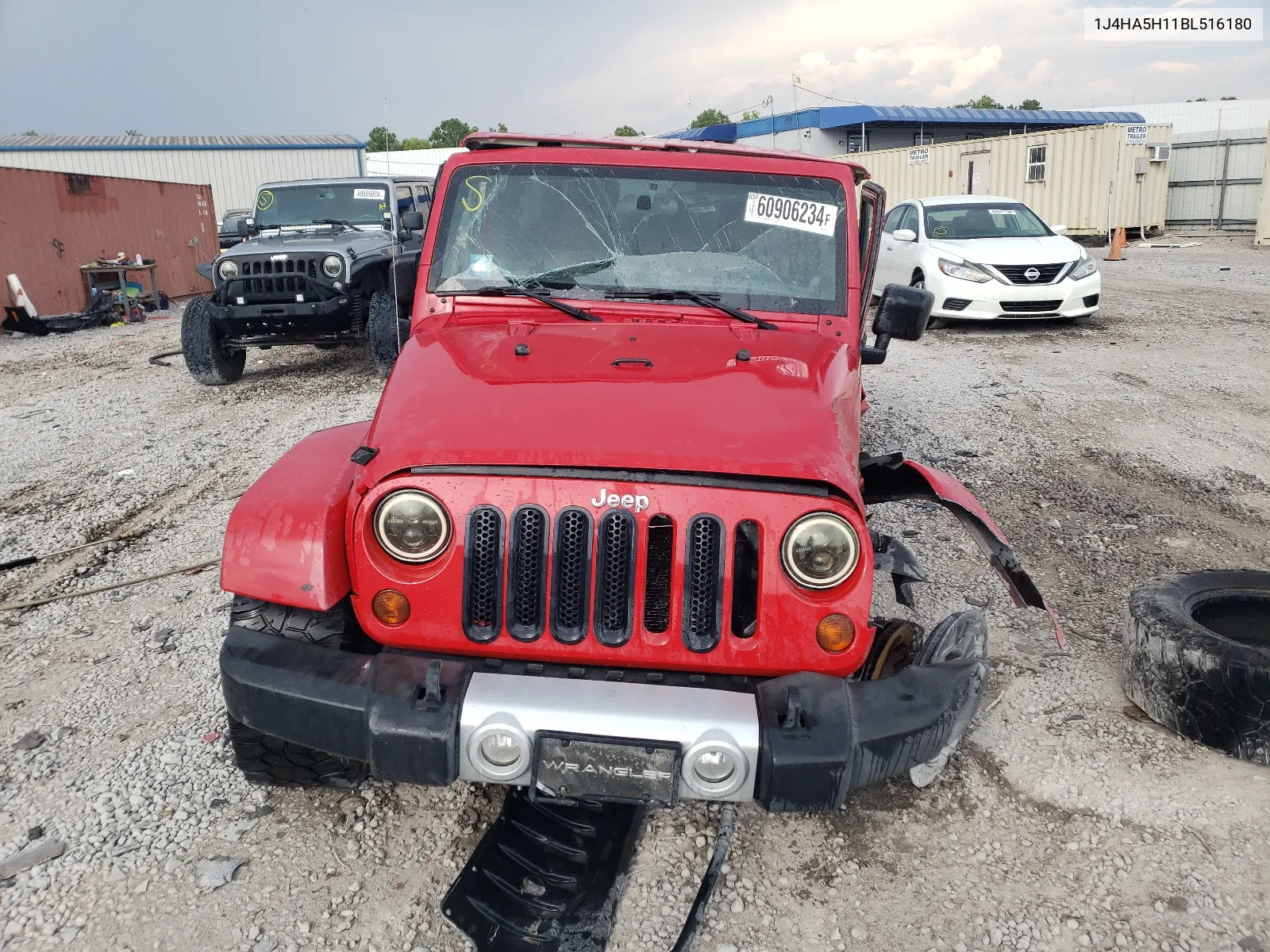 2011 Jeep Wrangler Unlimited Sahara VIN: 1J4HA5H11BL516180 Lot: 60906234