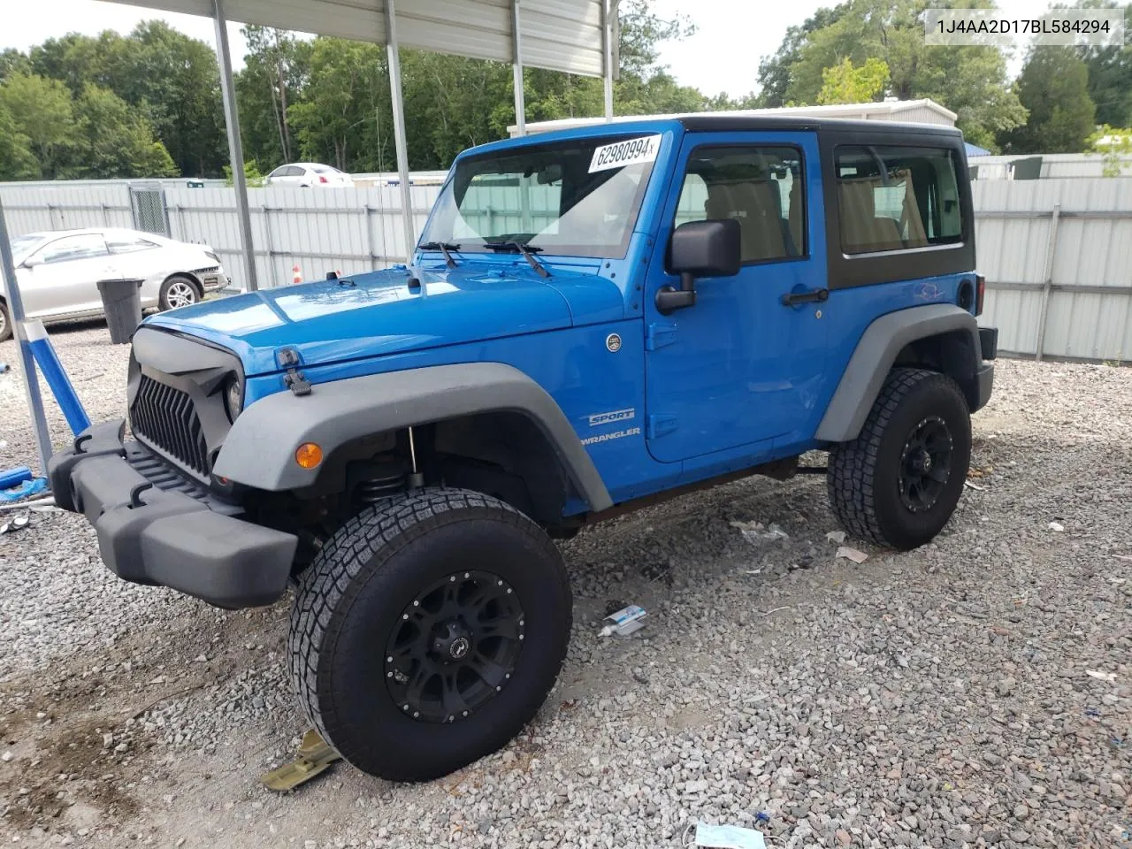 2011 Jeep Wrangler Sport VIN: 1J4AA2D17BL584294 Lot: 62980994