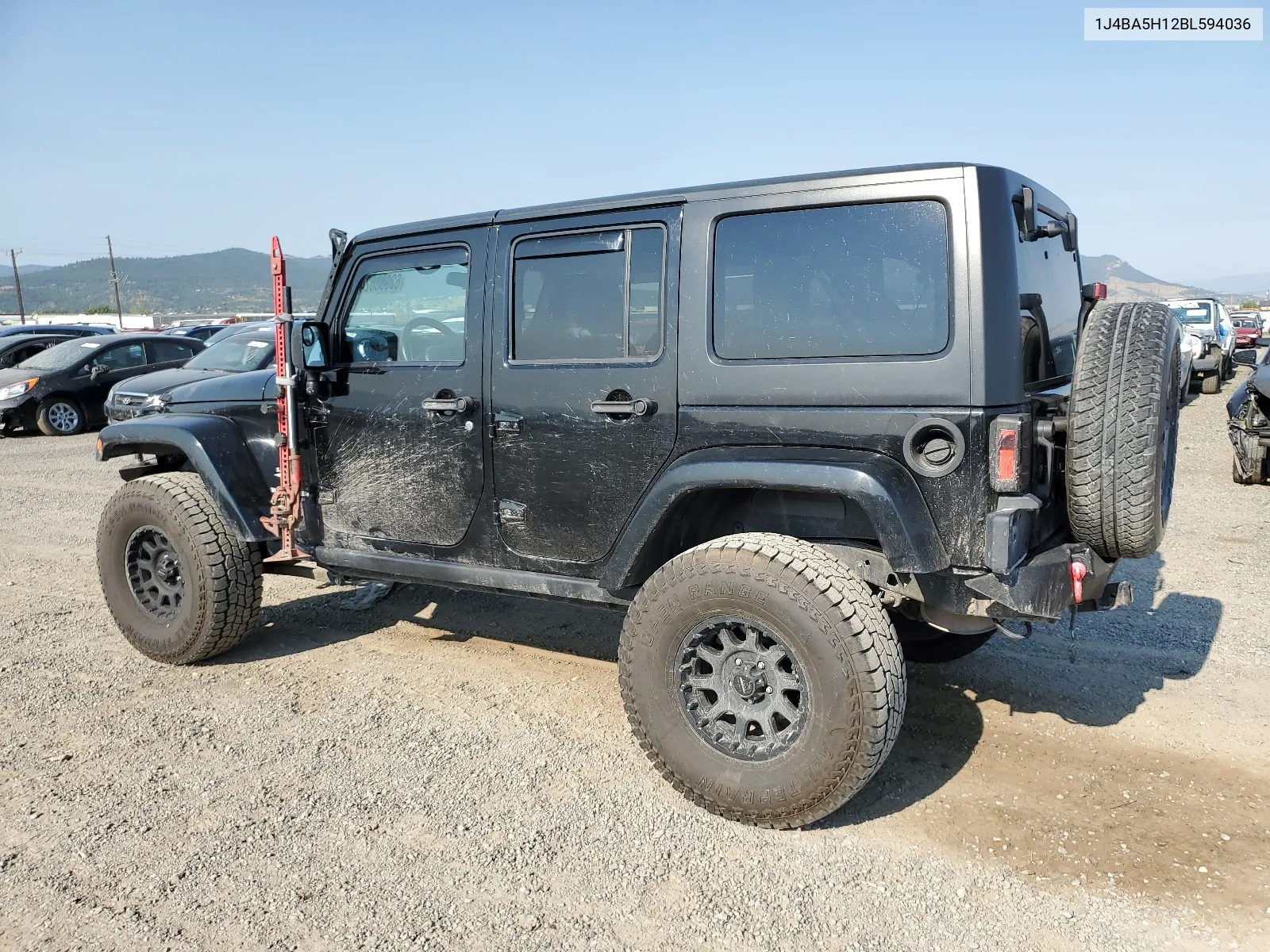 2011 Jeep Wrangler Unlimited Sahara VIN: 1J4BA5H12BL594036 Lot: 62988624