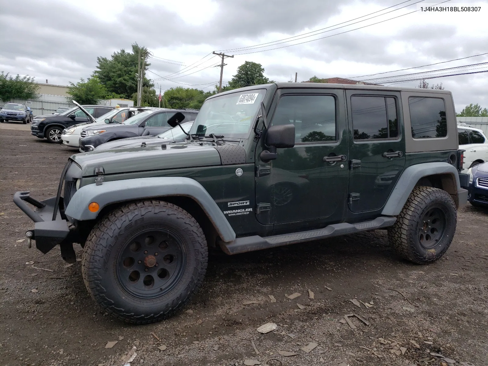 2011 Jeep Wrangler Unlimited Sport VIN: 1J4HA3H18BL508307 Lot: 63874094