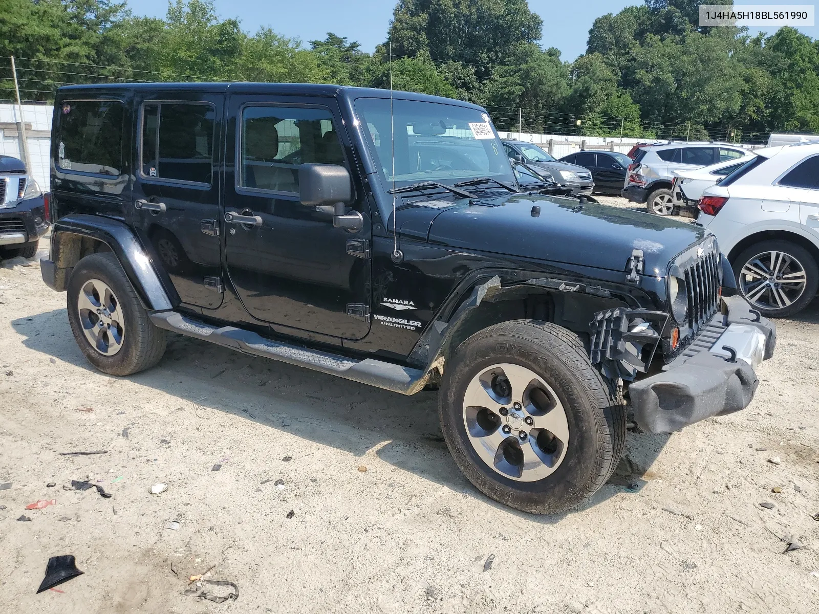 2011 Jeep Wrangler Unlimited Sahara VIN: 1J4HA5H18BL561990 Lot: 64546914