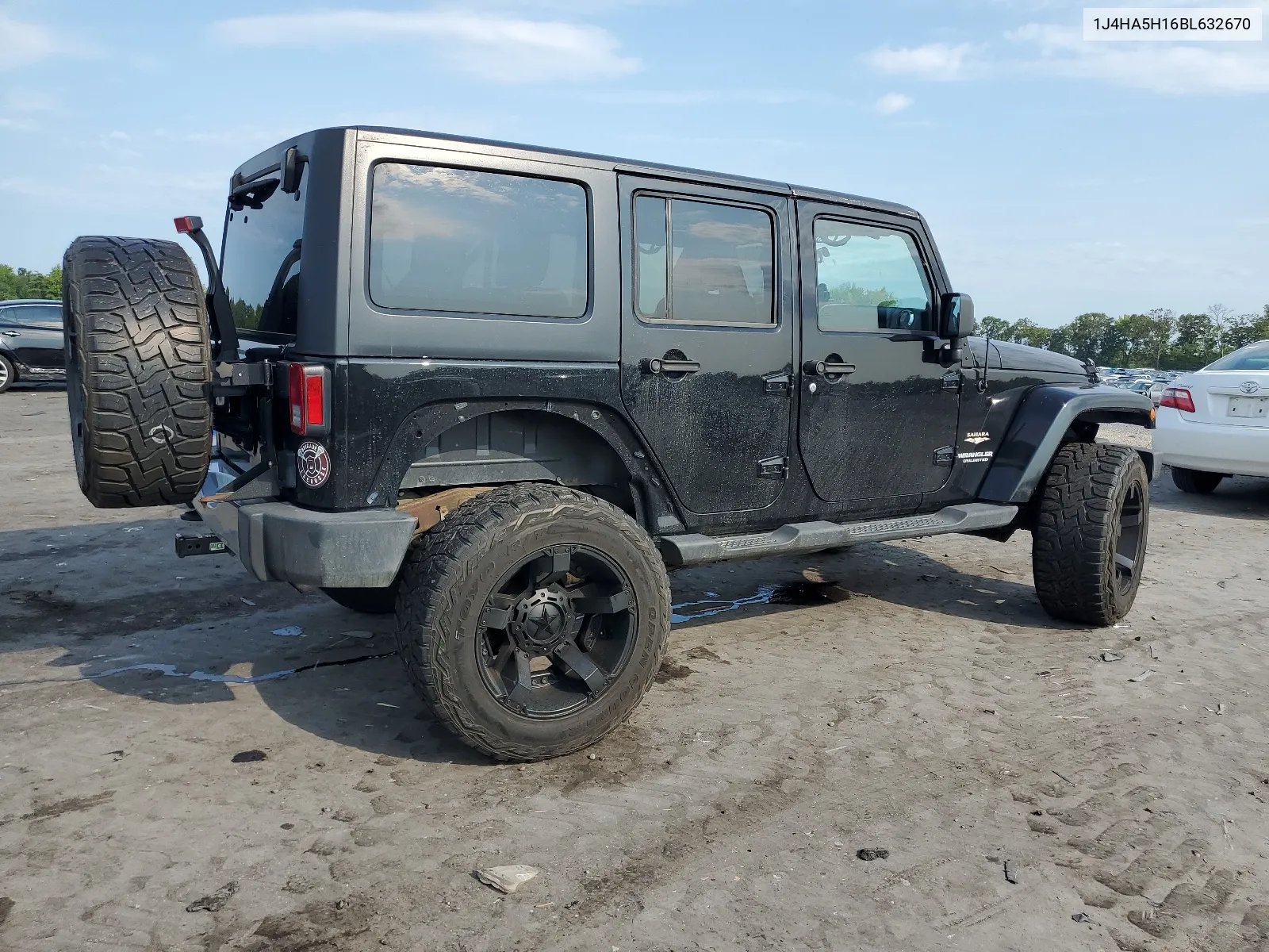 2011 Jeep Wrangler Unlimited Sahara VIN: 1J4HA5H16BL632670 Lot: 64578824