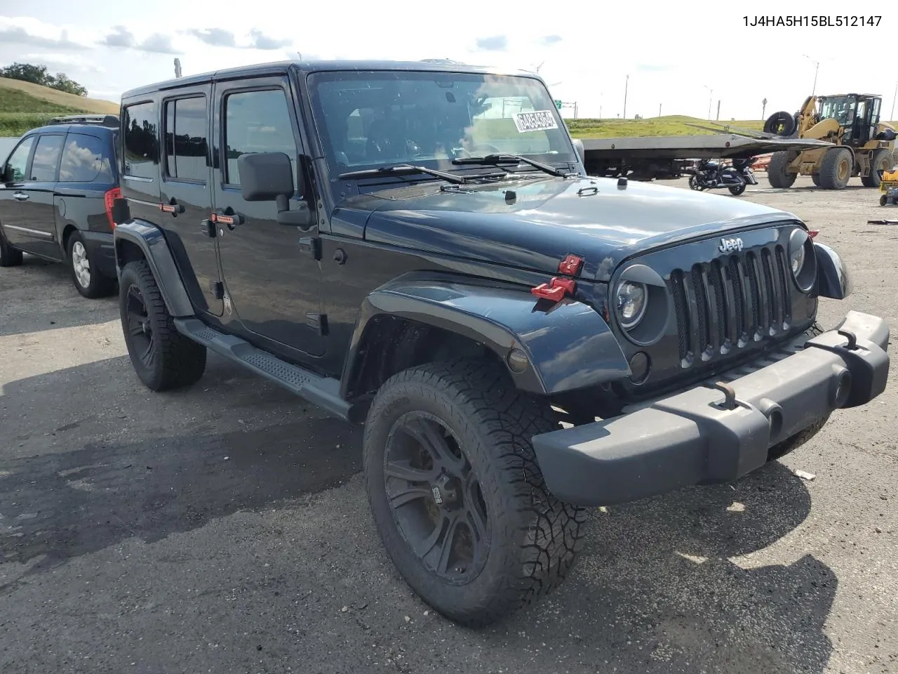 2011 Jeep Wrangler Unlimited Sahara VIN: 1J4HA5H15BL512147 Lot: 64854364