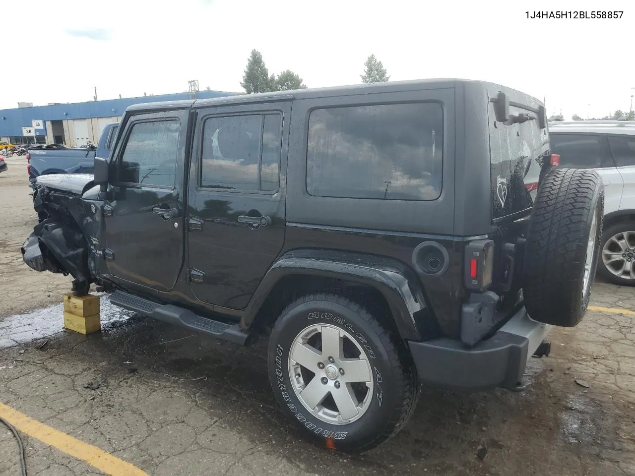 2011 Jeep Wrangler Unlimited Sahara VIN: 1J4HA5H12BL558857 Lot: 65338404