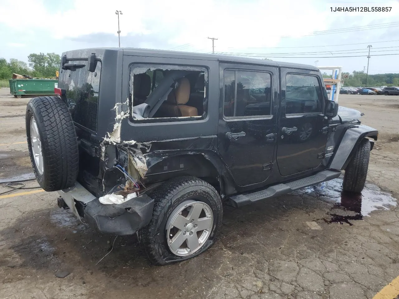 2011 Jeep Wrangler Unlimited Sahara VIN: 1J4HA5H12BL558857 Lot: 65338404