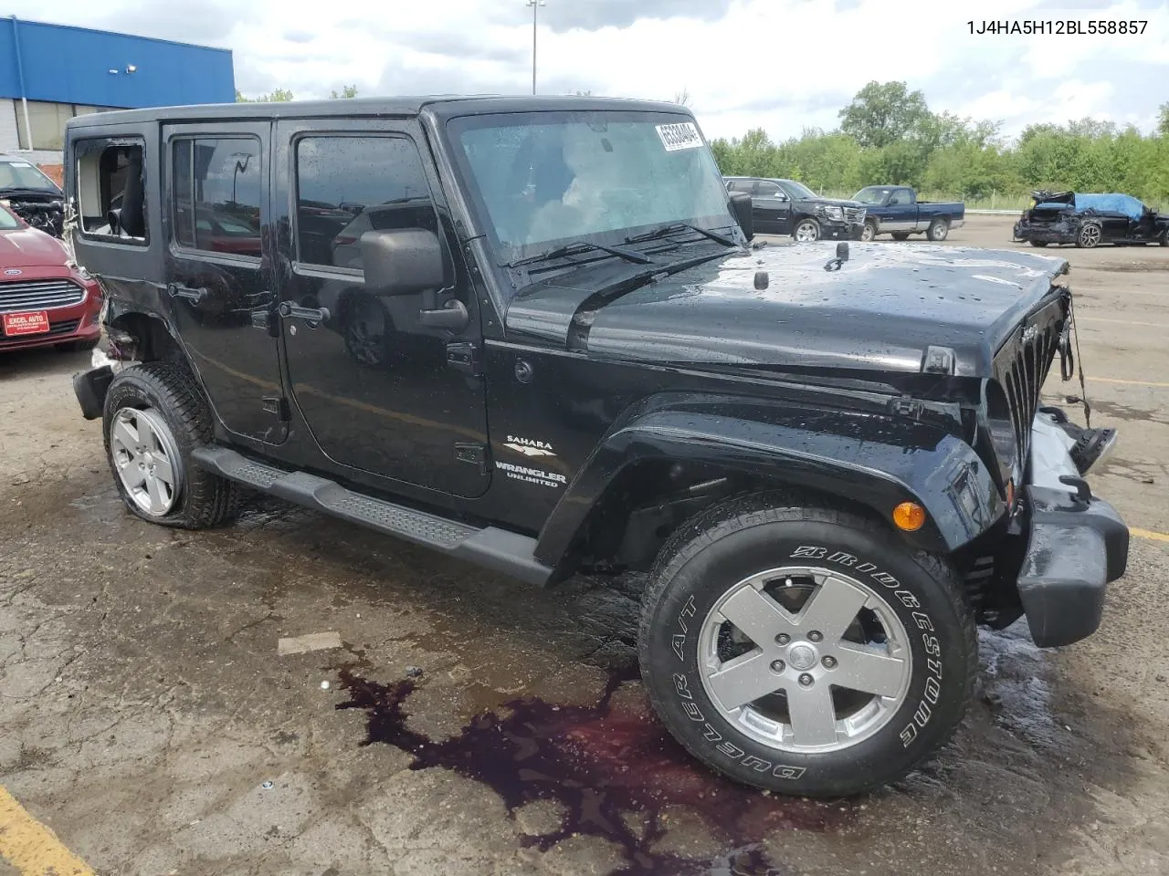 2011 Jeep Wrangler Unlimited Sahara VIN: 1J4HA5H12BL558857 Lot: 65338404