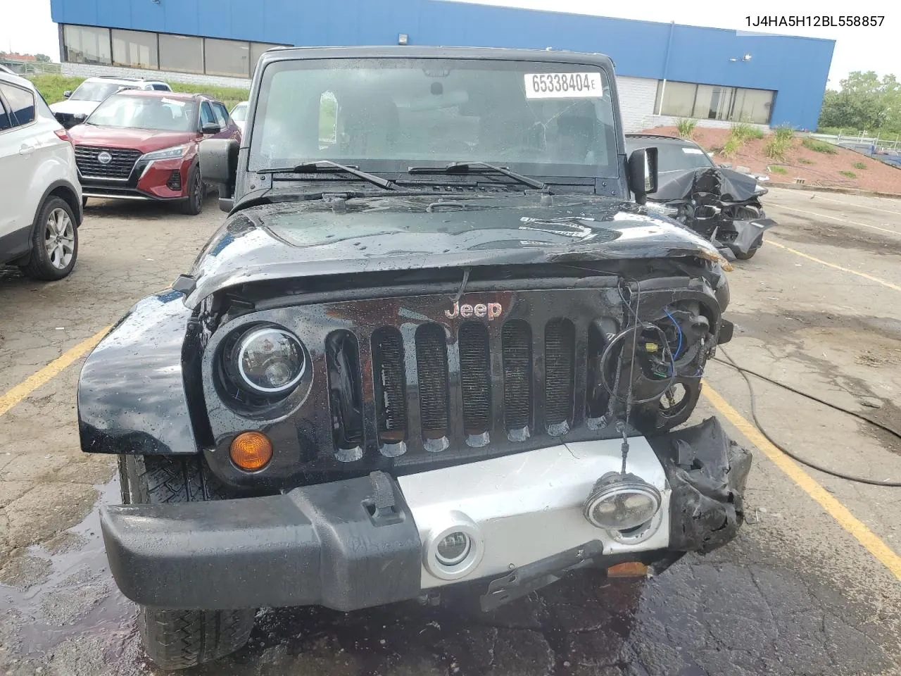 2011 Jeep Wrangler Unlimited Sahara VIN: 1J4HA5H12BL558857 Lot: 65338404