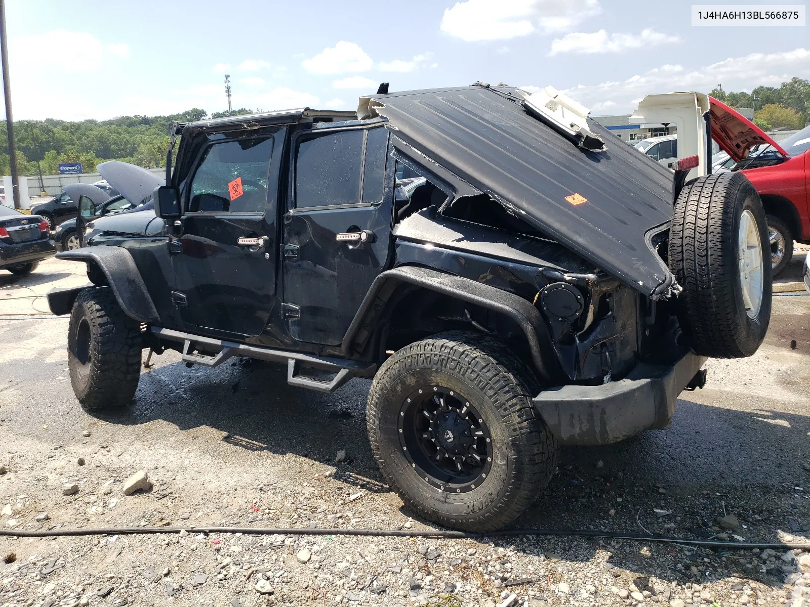 2011 Jeep Wrangler Unlimited Rubicon VIN: 1J4HA6H13BL566875 Lot: 65685674