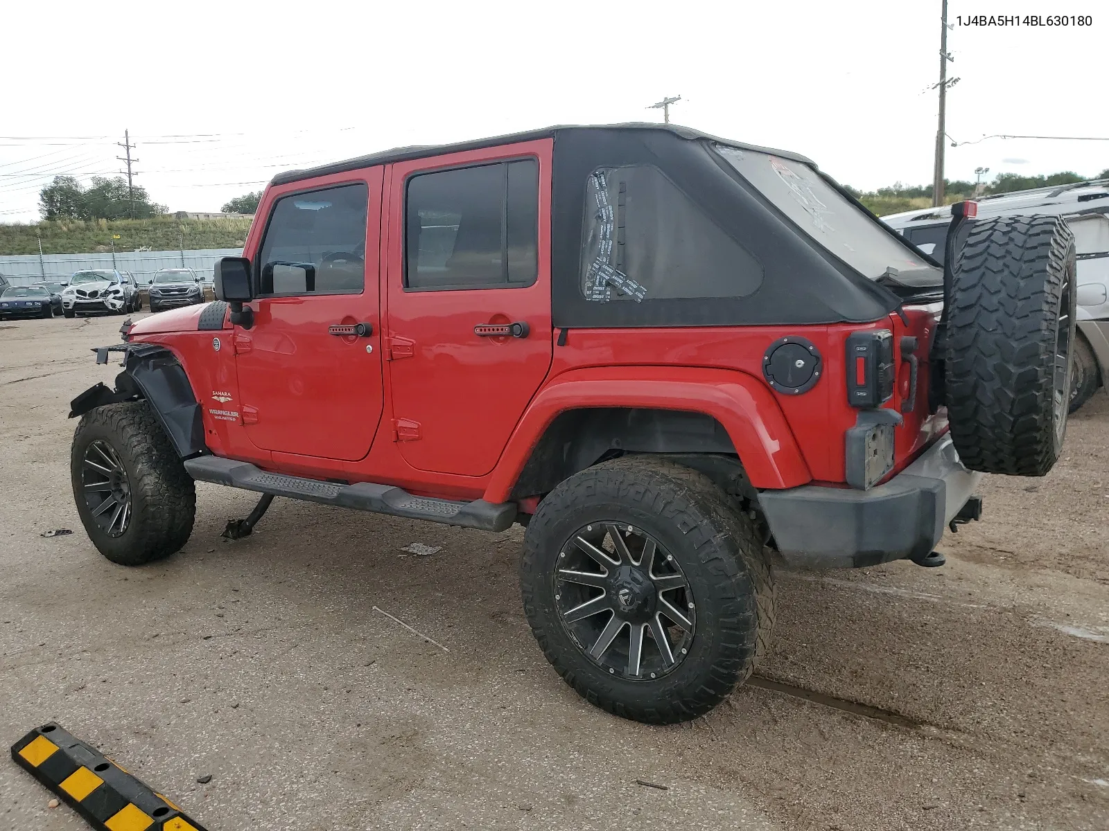 2011 Jeep Wrangler Unlimited Sahara VIN: 1J4BA5H14BL630180 Lot: 67254164