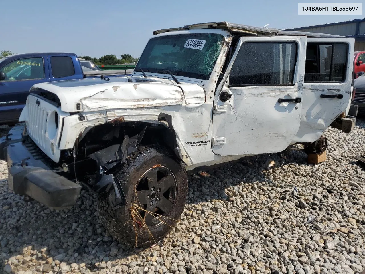 2011 Jeep Wrangler Unlimited Sahara VIN: 1J4BA5H11BL555597 Lot: 68416284