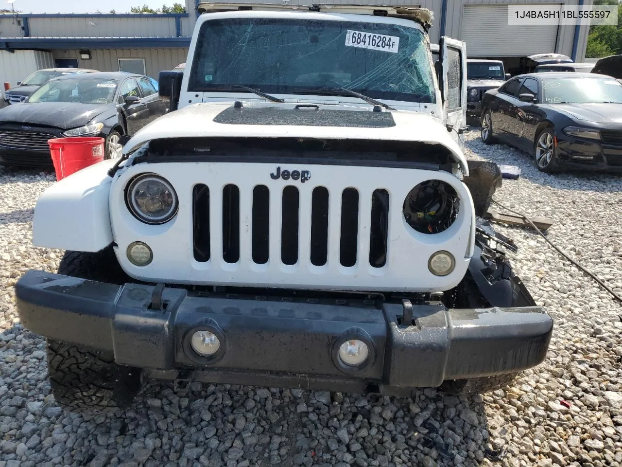 2011 Jeep Wrangler Unlimited Sahara VIN: 1J4BA5H11BL555597 Lot: 68416284