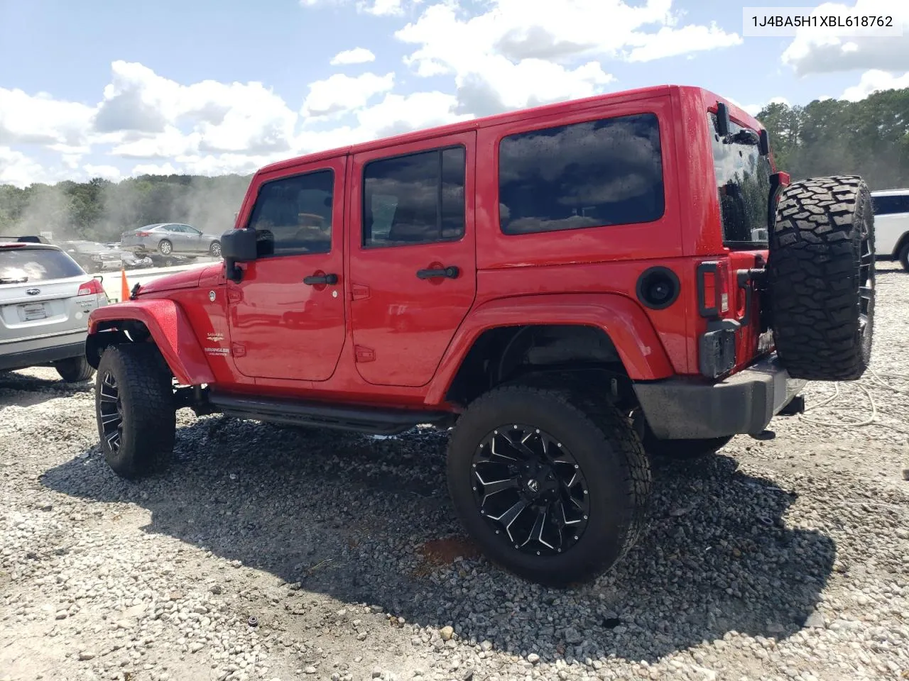 2011 Jeep Wrangler Unlimited Sahara VIN: 1J4BA5H1XBL618762 Lot: 68447464