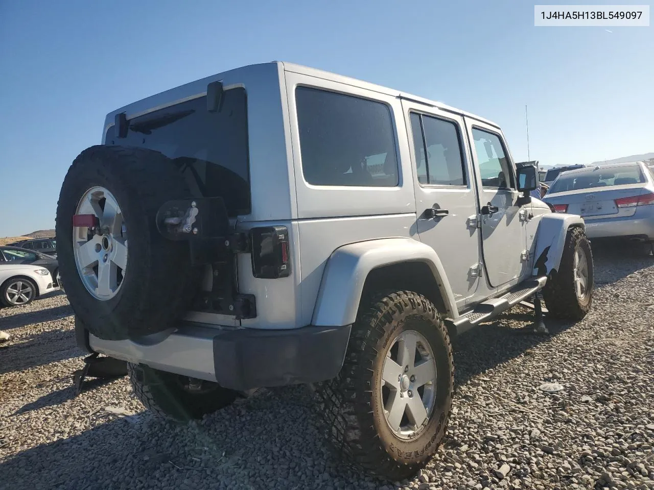 2011 Jeep Wrangler Unlimited Sahara VIN: 1J4HA5H13BL549097 Lot: 68943064