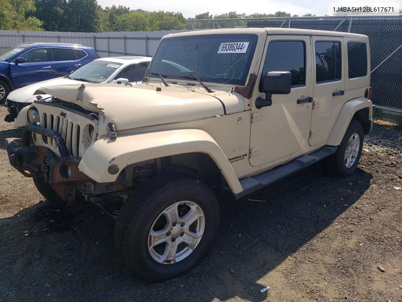 2011 Jeep Wrangler Unlimited Sahara VIN: 1J4BA5H12BL617671 Lot: 69386344