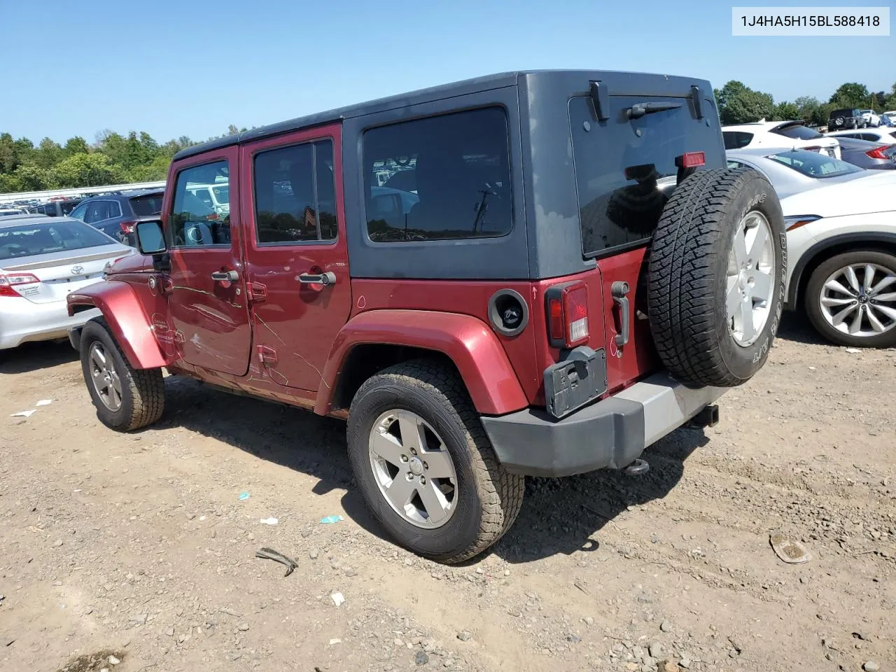 1J4HA5H15BL588418 2011 Jeep Wrangler Unlimited Sahara