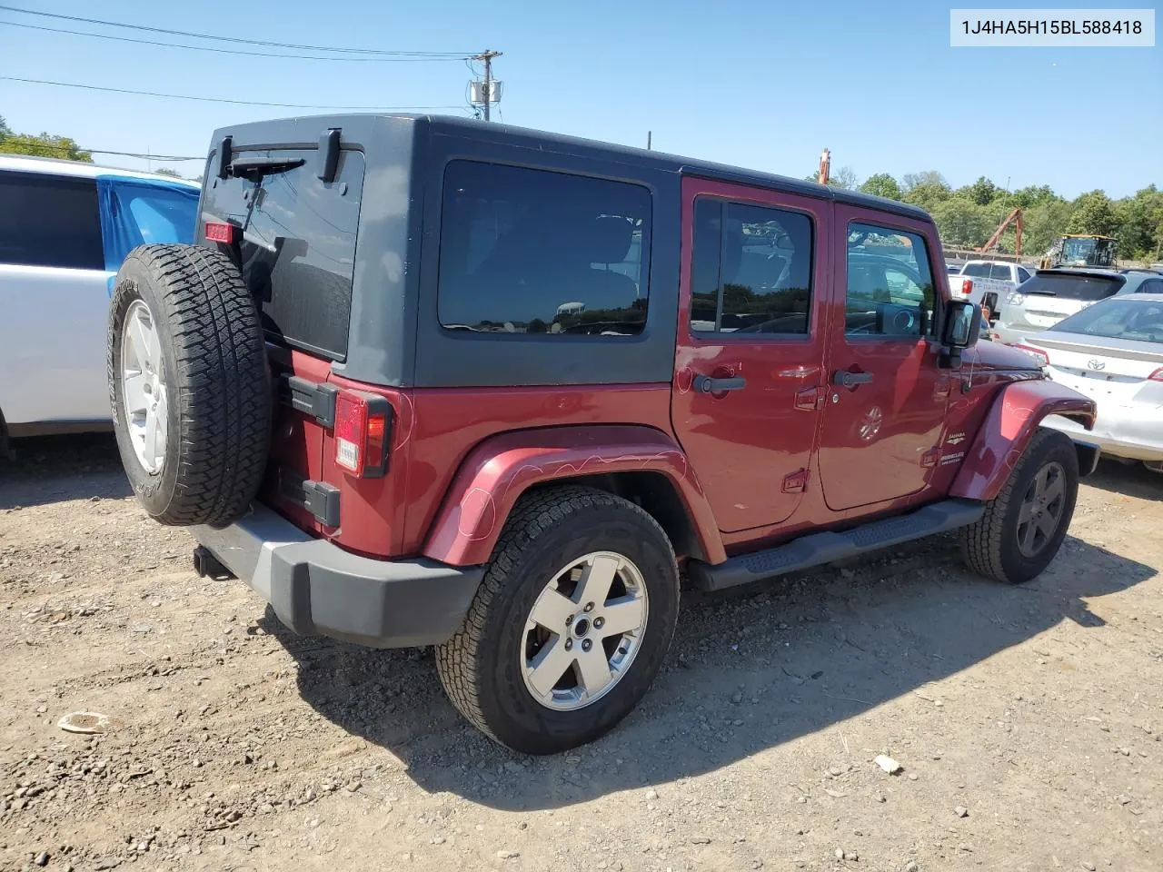 1J4HA5H15BL588418 2011 Jeep Wrangler Unlimited Sahara