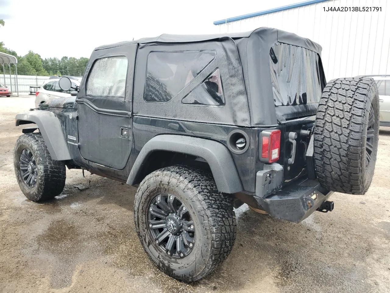 2011 Jeep Wrangler Sport VIN: 1J4AA2D13BL521791 Lot: 69938774