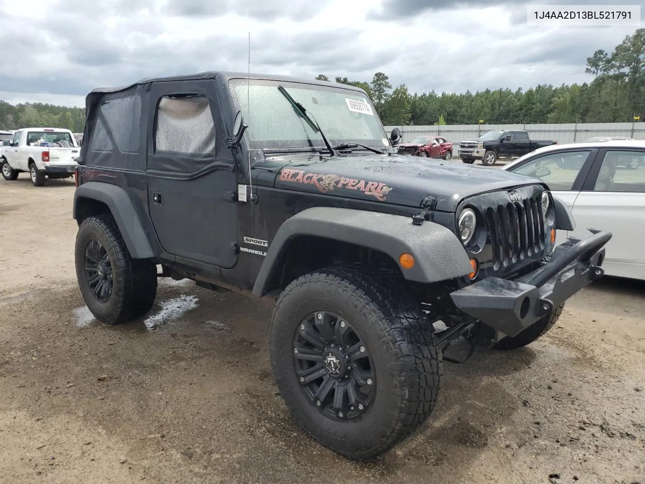 2011 Jeep Wrangler Sport VIN: 1J4AA2D13BL521791 Lot: 69938774