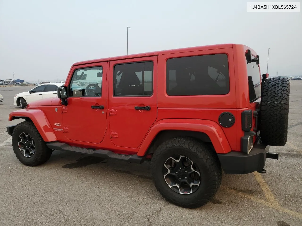 2011 Jeep Wrangler Unlimited Sahara VIN: 1J4BA5H1XBL565724 Lot: 70281464