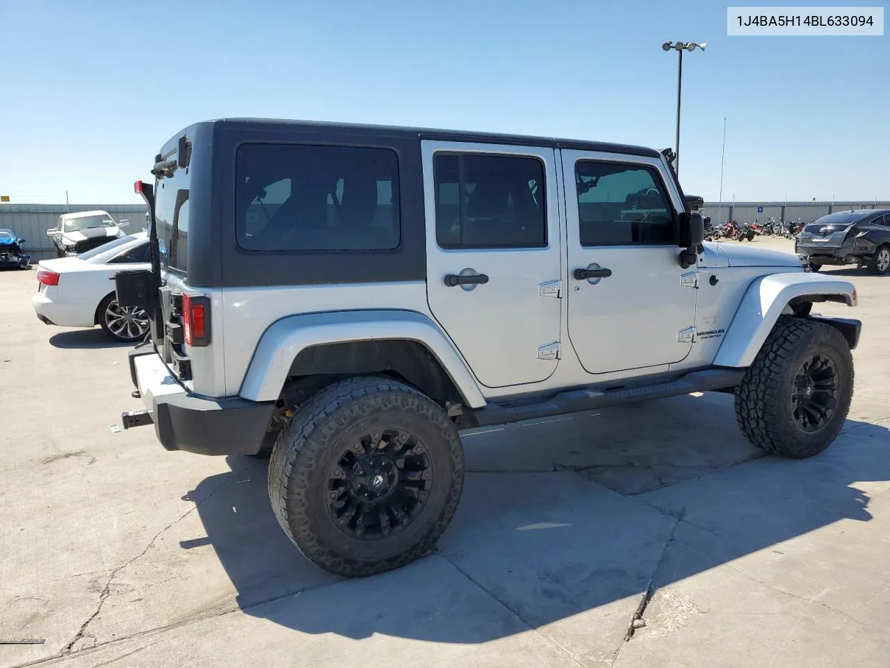 2011 Jeep Wrangler Unlimited Sahara VIN: 1J4BA5H14BL633094 Lot: 70475714