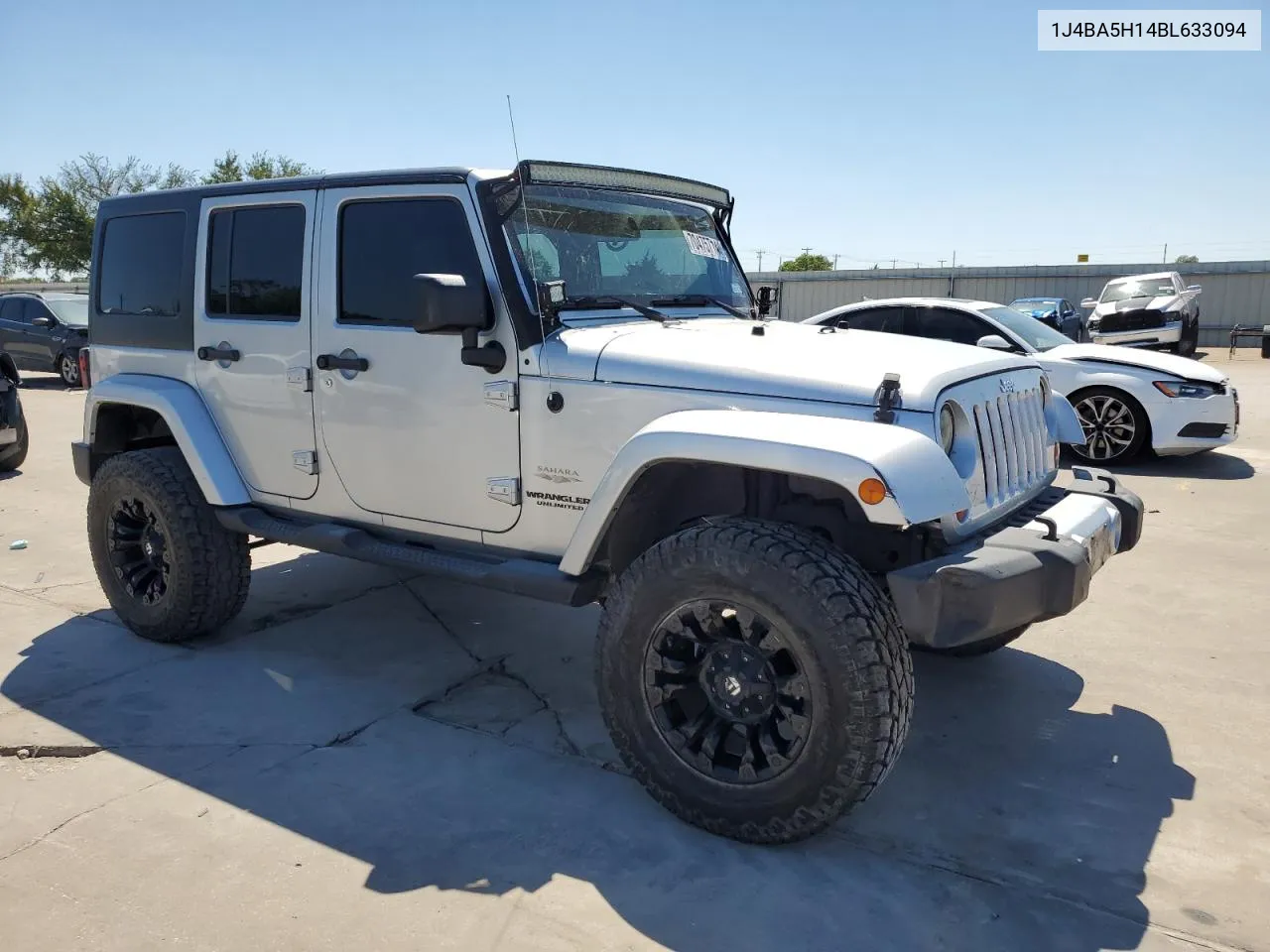 2011 Jeep Wrangler Unlimited Sahara VIN: 1J4BA5H14BL633094 Lot: 70475714