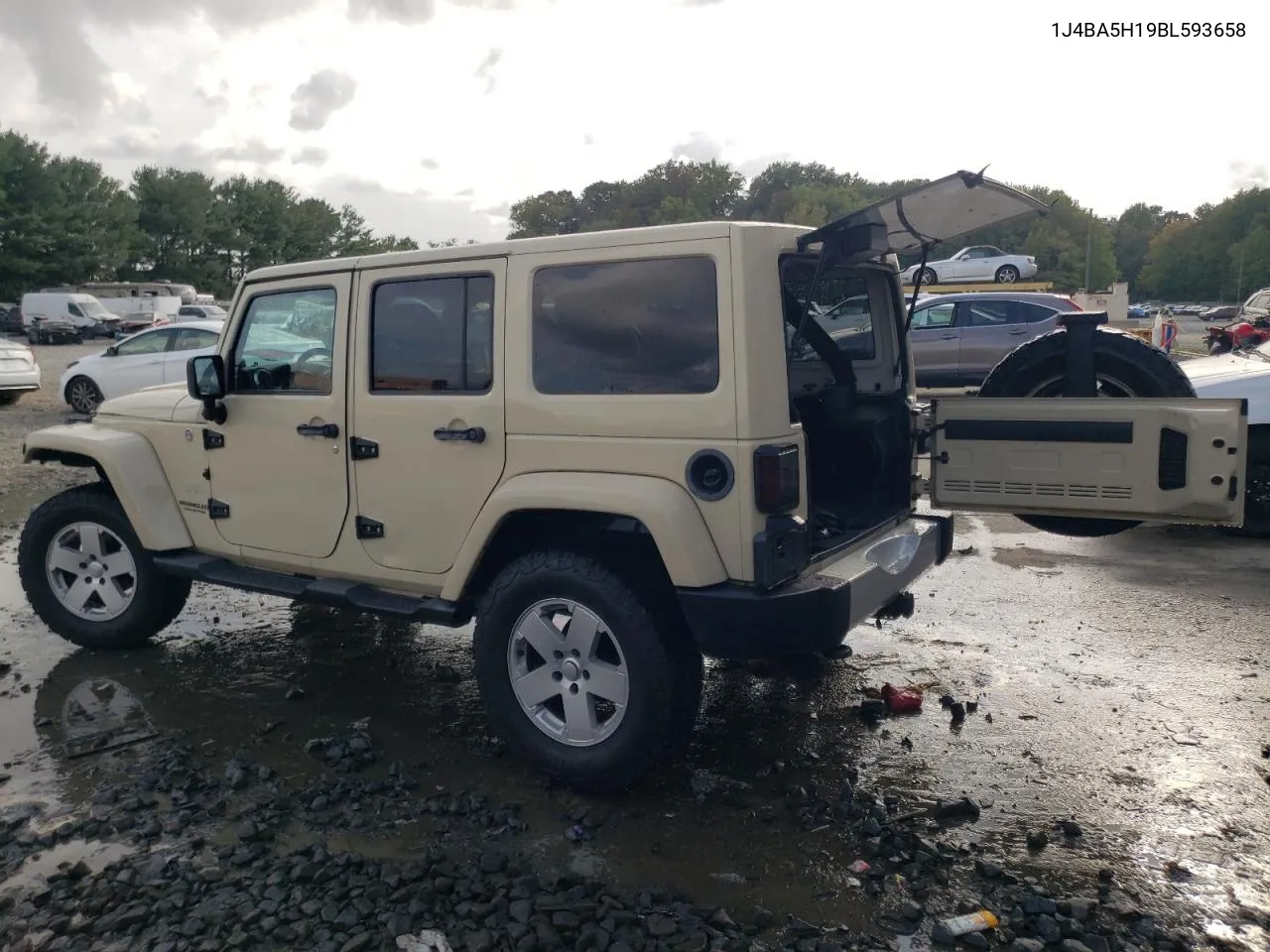 2011 Jeep Wrangler Unlimited Sahara VIN: 1J4BA5H19BL593658 Lot: 71947684