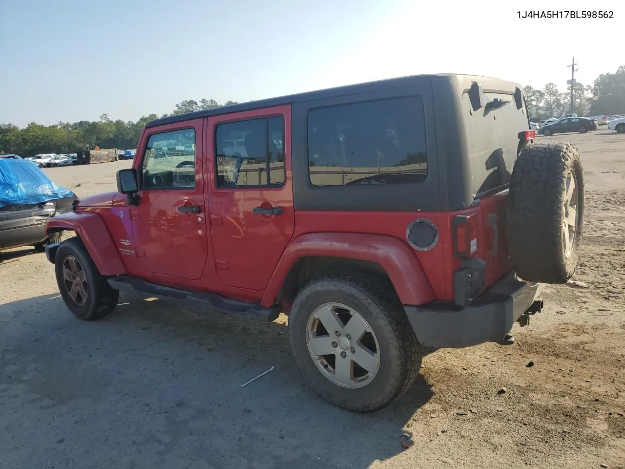 2011 Jeep Wrangler Unlimited Sahara VIN: 1J4HA5H17BL598562 Lot: 72254174