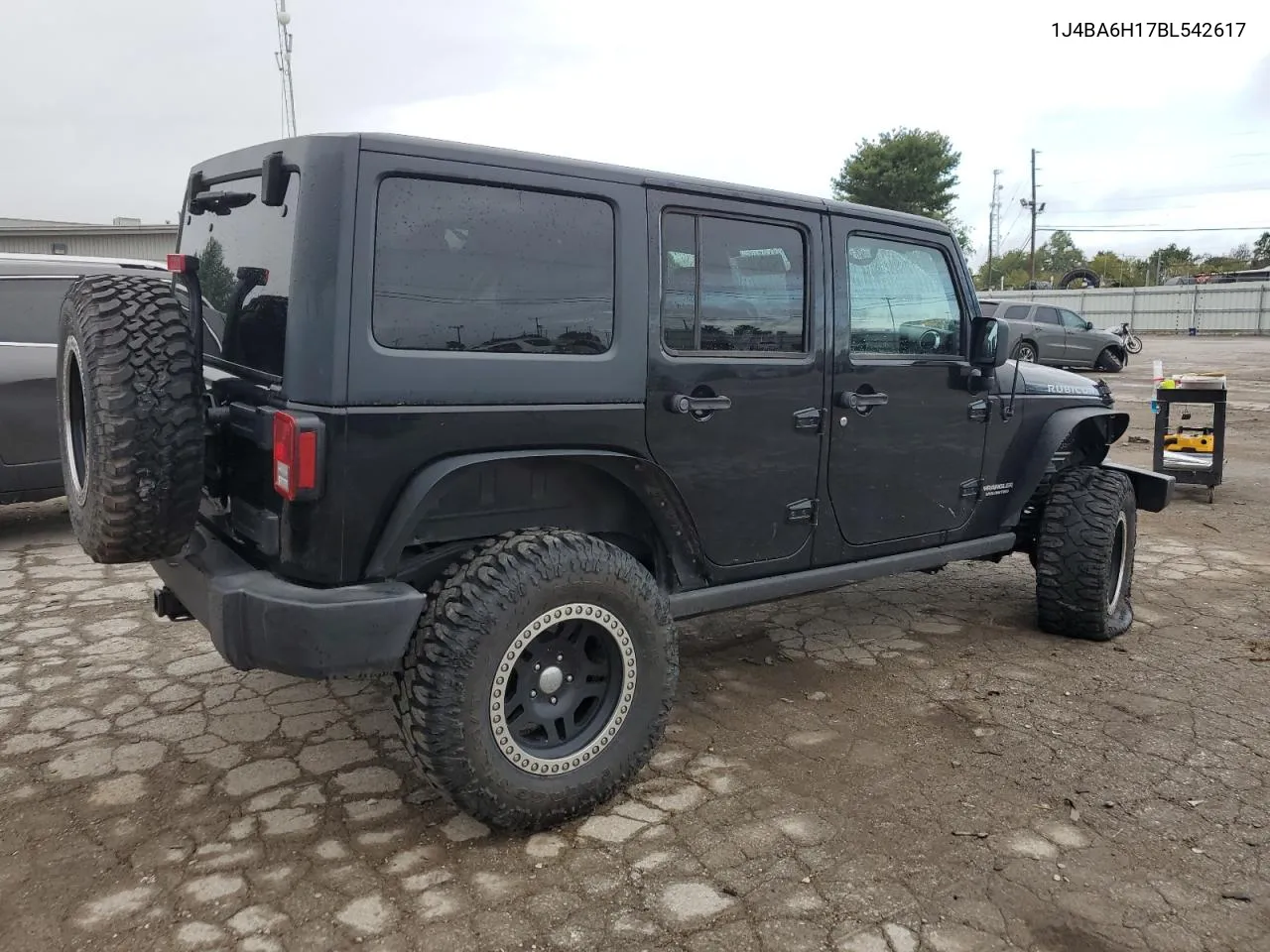 2011 Jeep Wrangler Unlimited Rubicon VIN: 1J4BA6H17BL542617 Lot: 72536104