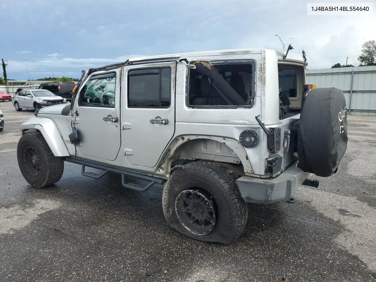 2011 Jeep Wrangler Unlimited Sahara VIN: 1J4BA5H14BL554640 Lot: 73009134