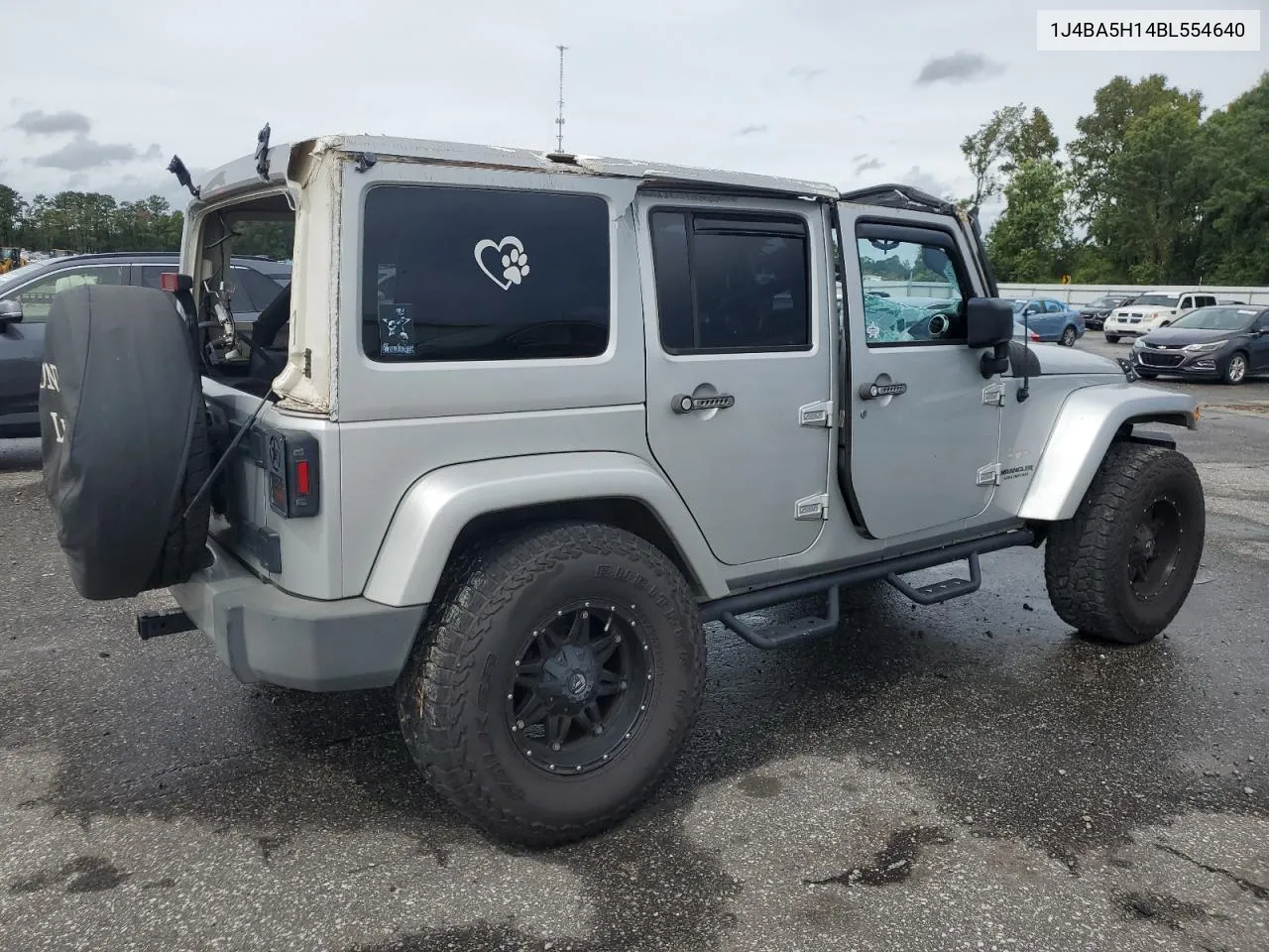 2011 Jeep Wrangler Unlimited Sahara VIN: 1J4BA5H14BL554640 Lot: 73009134