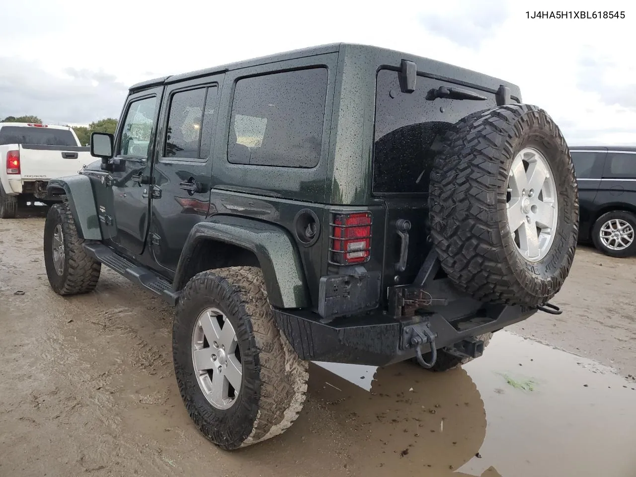 2011 Jeep Wrangler Unlimited Sahara VIN: 1J4HA5H1XBL618545 Lot: 73925744