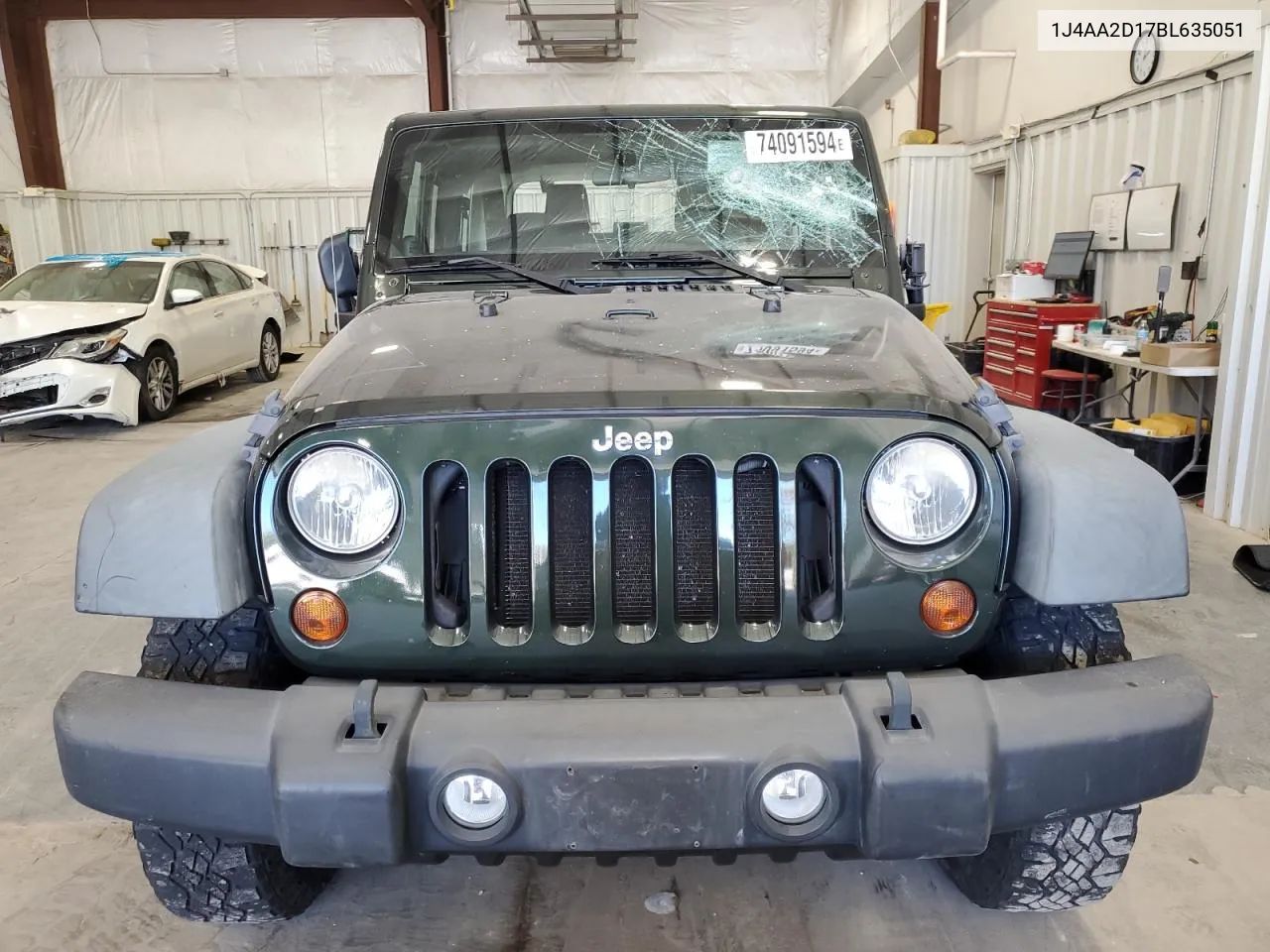 2011 Jeep Wrangler Sport VIN: 1J4AA2D17BL635051 Lot: 74091594