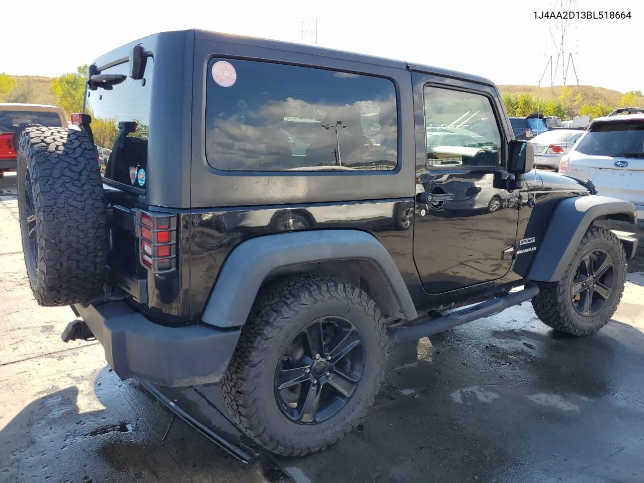 2011 Jeep Wrangler Sport VIN: 1J4AA2D13BL518664 Lot: 74291544