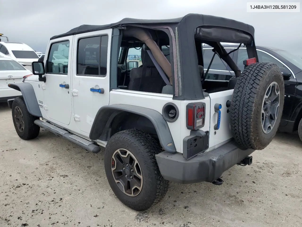 2011 Jeep Wrangler Unlimited Sport VIN: 1J4BA3H12BL581209 Lot: 74675584