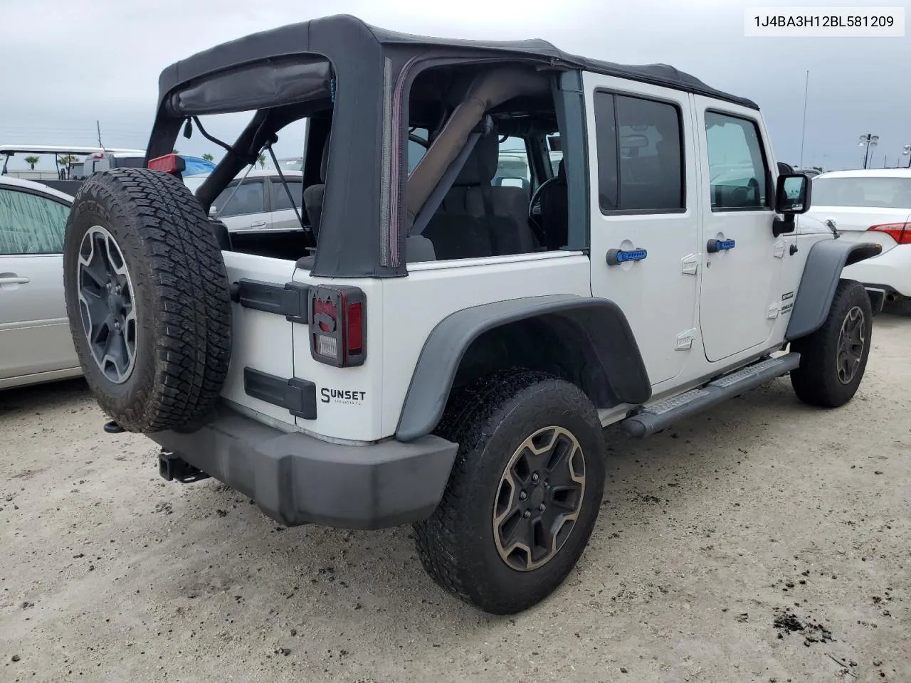 2011 Jeep Wrangler Unlimited Sport VIN: 1J4BA3H12BL581209 Lot: 74675584