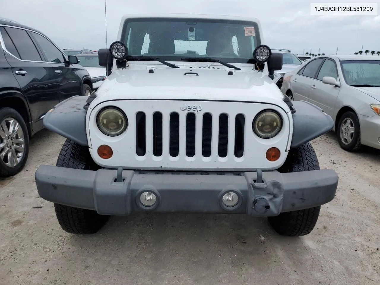 2011 Jeep Wrangler Unlimited Sport VIN: 1J4BA3H12BL581209 Lot: 74675584