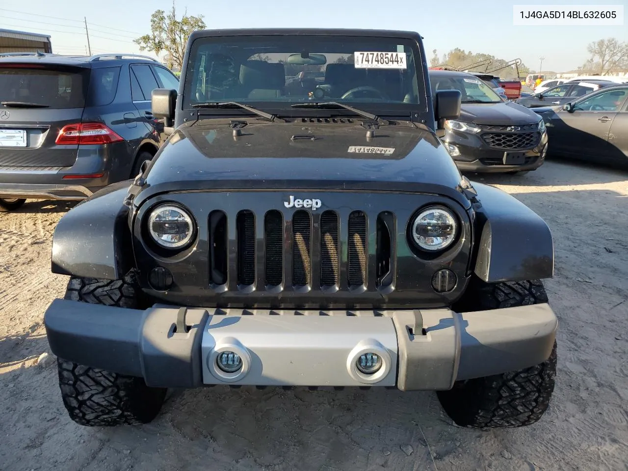 2011 Jeep Wrangler Sahara VIN: 1J4GA5D14BL632605 Lot: 74748544