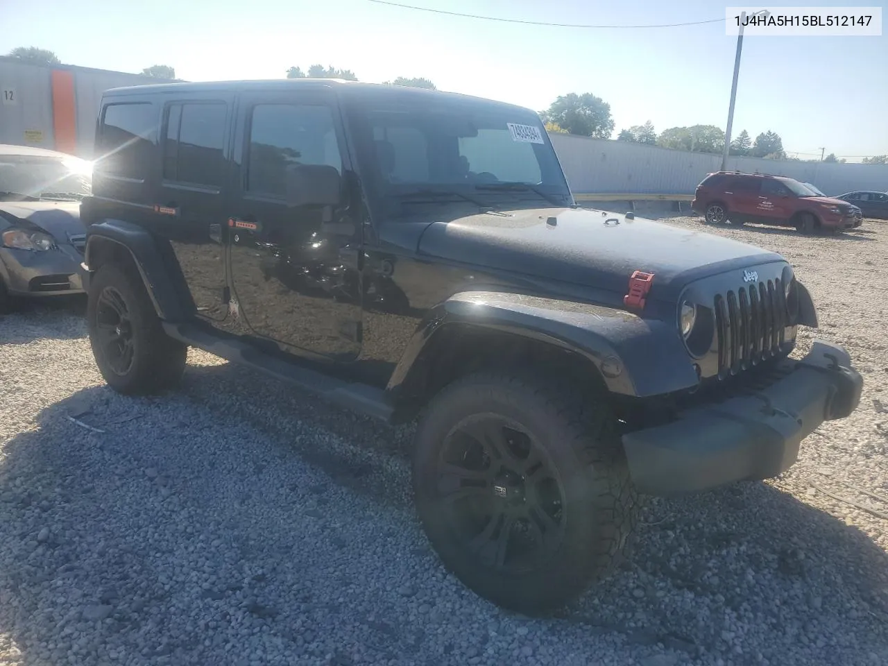 2011 Jeep Wrangler Unlimited Sahara VIN: 1J4HA5H15BL512147 Lot: 74834394