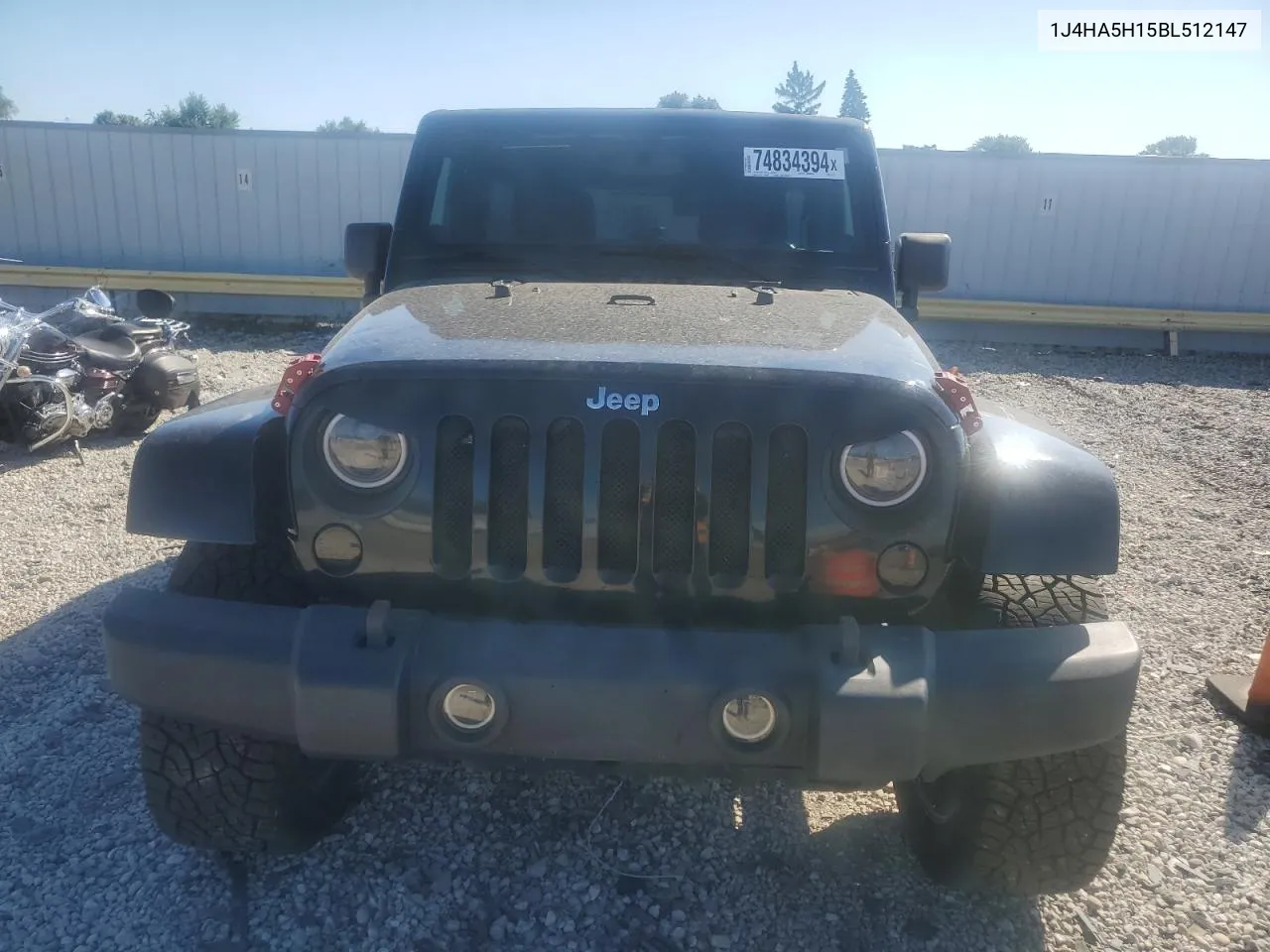 2011 Jeep Wrangler Unlimited Sahara VIN: 1J4HA5H15BL512147 Lot: 74834394