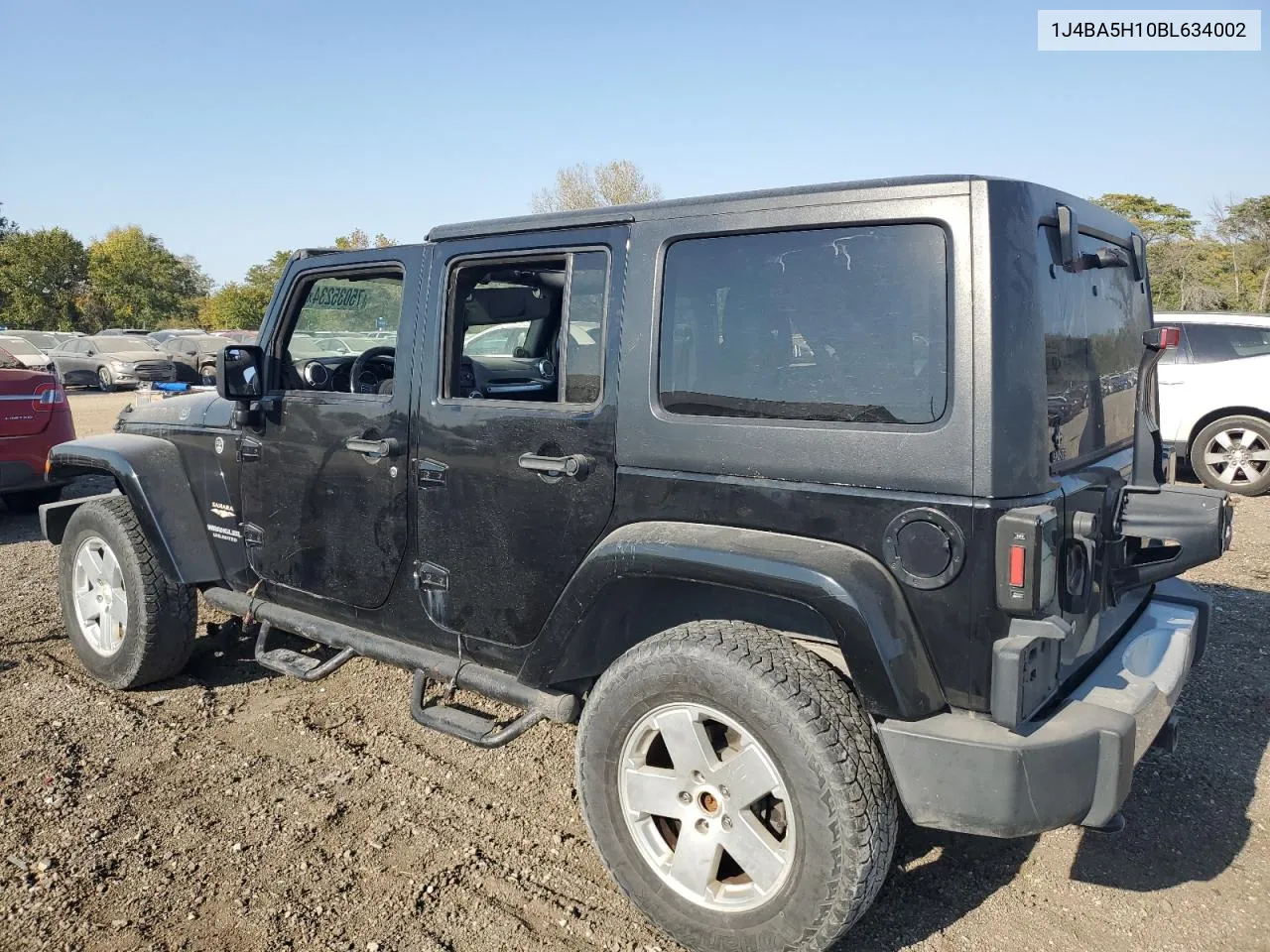 2011 Jeep Wrangler Unlimited Sahara VIN: 1J4BA5H10BL634002 Lot: 75035234