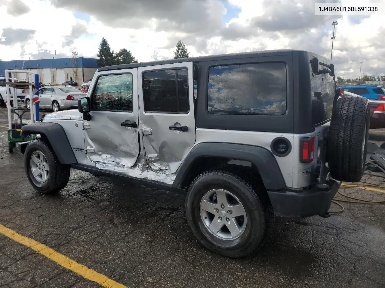 2011 Jeep Wrangler Unlimited Rubicon VIN: 1J4BA6H16BL591338 Lot: 75768094