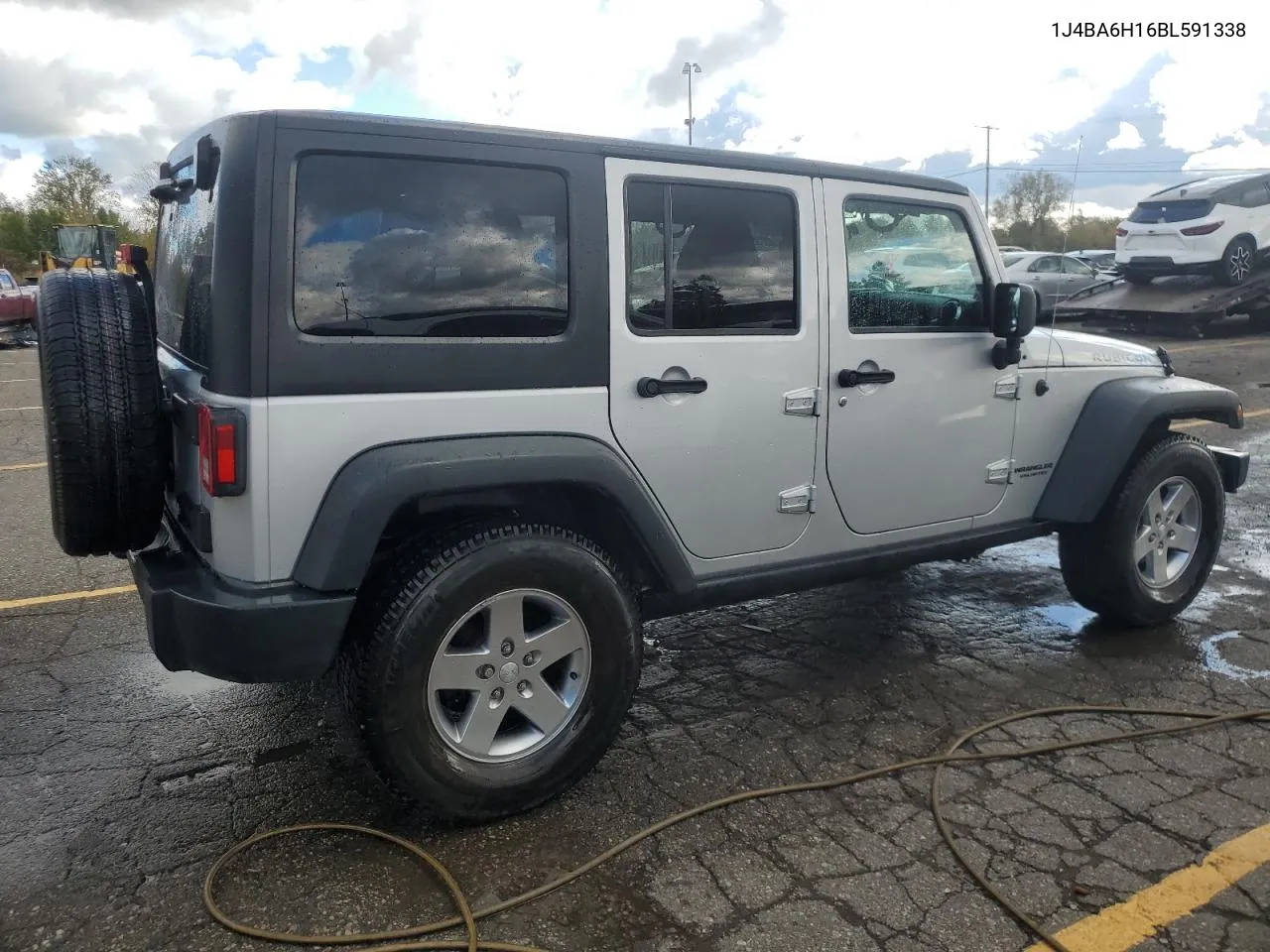 2011 Jeep Wrangler Unlimited Rubicon VIN: 1J4BA6H16BL591338 Lot: 75768094