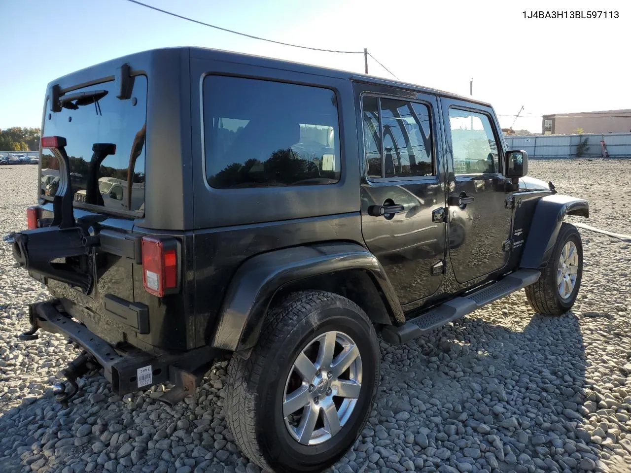 2011 Jeep Wrangler Unlimited Sport VIN: 1J4BA3H13BL597113 Lot: 76066724