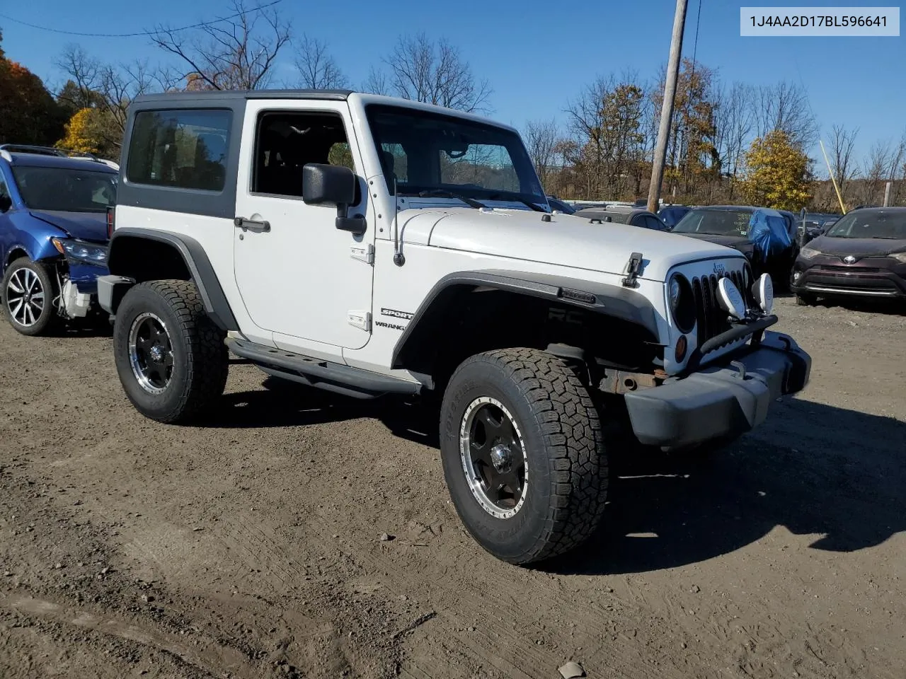 2011 Jeep Wrangler Sport VIN: 1J4AA2D17BL596641 Lot: 76639714