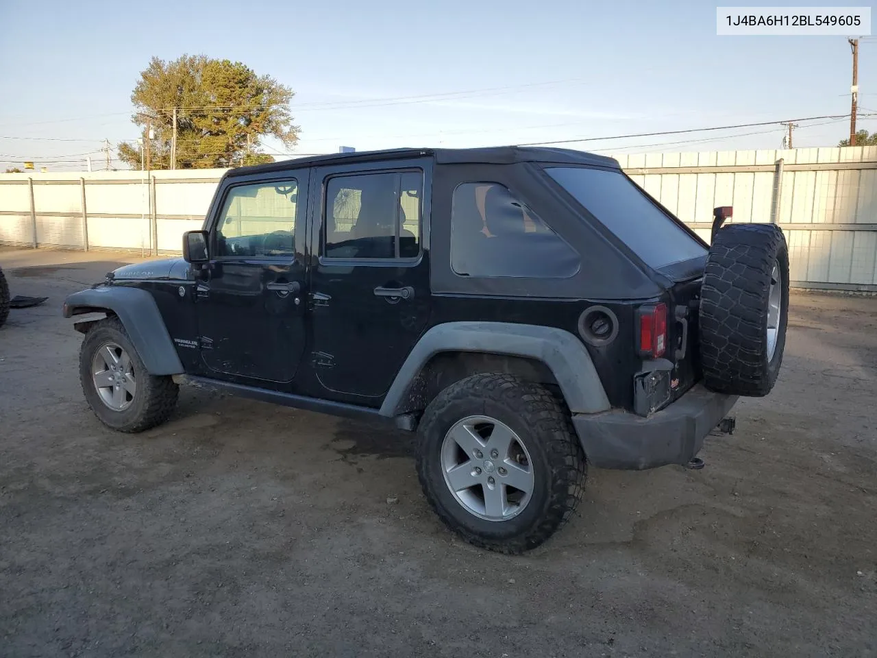 2011 Jeep Wrangler Unlimited Rubicon VIN: 1J4BA6H12BL549605 Lot: 76708384